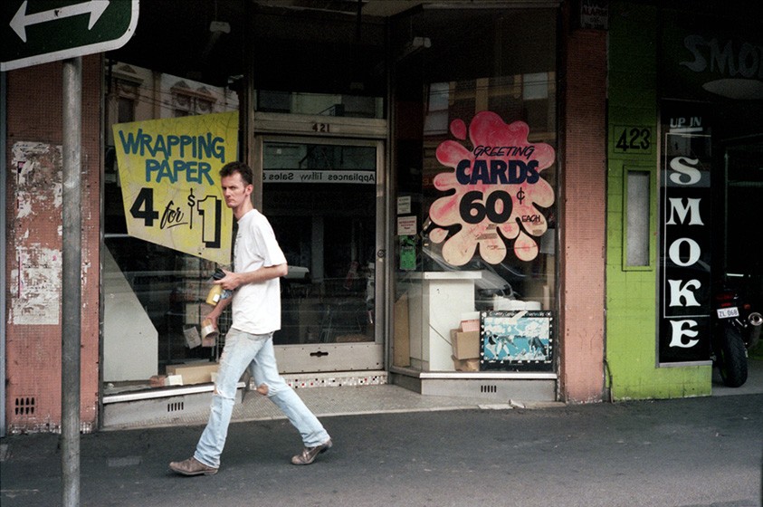 https://www.ed-templeton.com/files/gimgs/th-107_color photo man walking infront of store.jpg